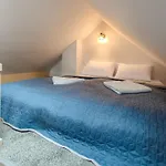 Gosciniec Zapiecek Rum i privatbostad Krutynski Piecek